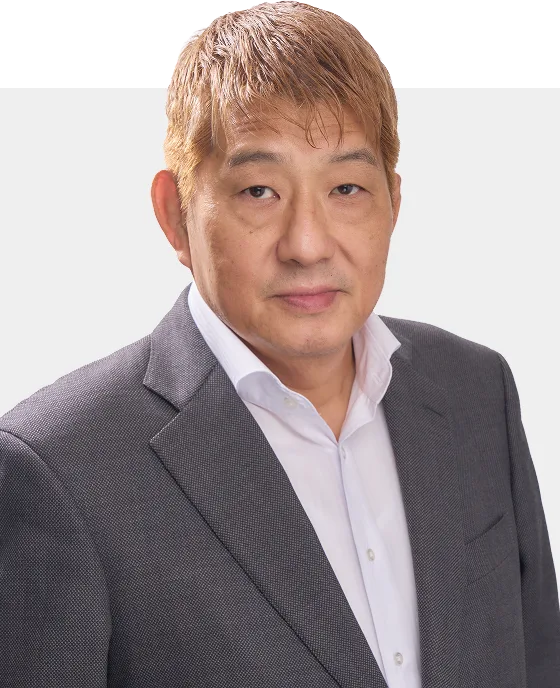 메이케이가쿠엔 중학교·고등학교 宮﨑 淳 교장의 상반신 사진